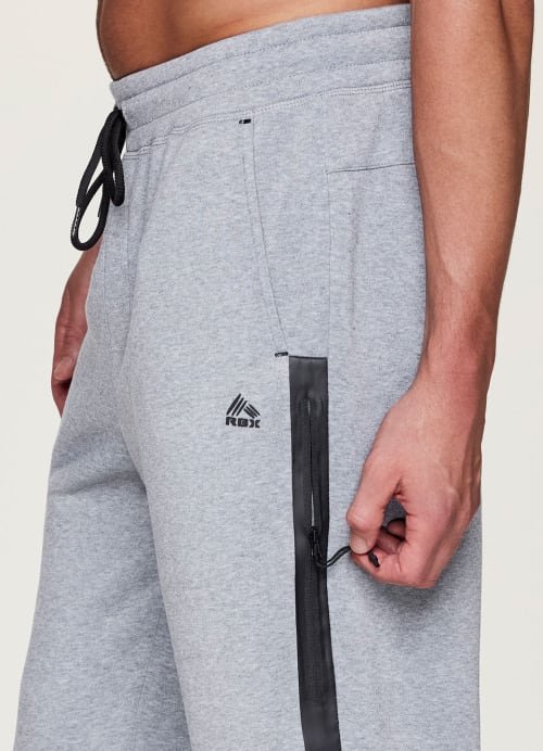 Men's Black RBX sweat pants in great condition size - Depop